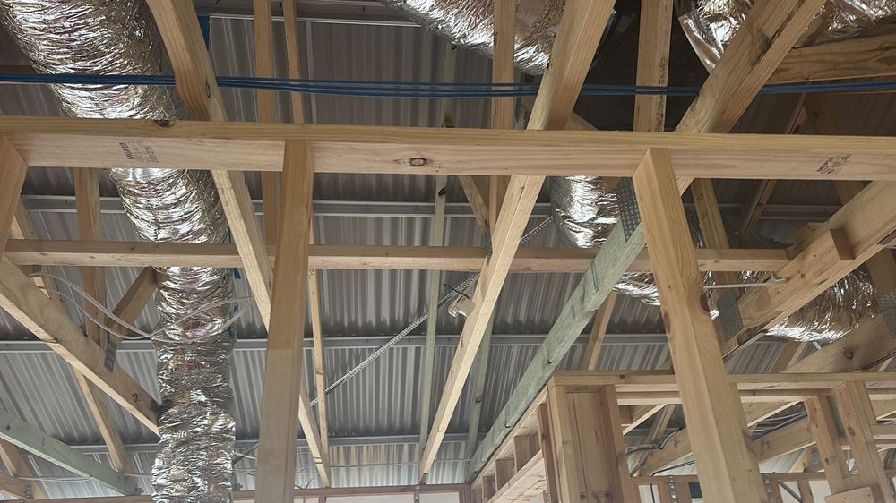 Sarking not installed beneath the metal roof sheeting, found during a lock-up stage inspection in Manor Lakes