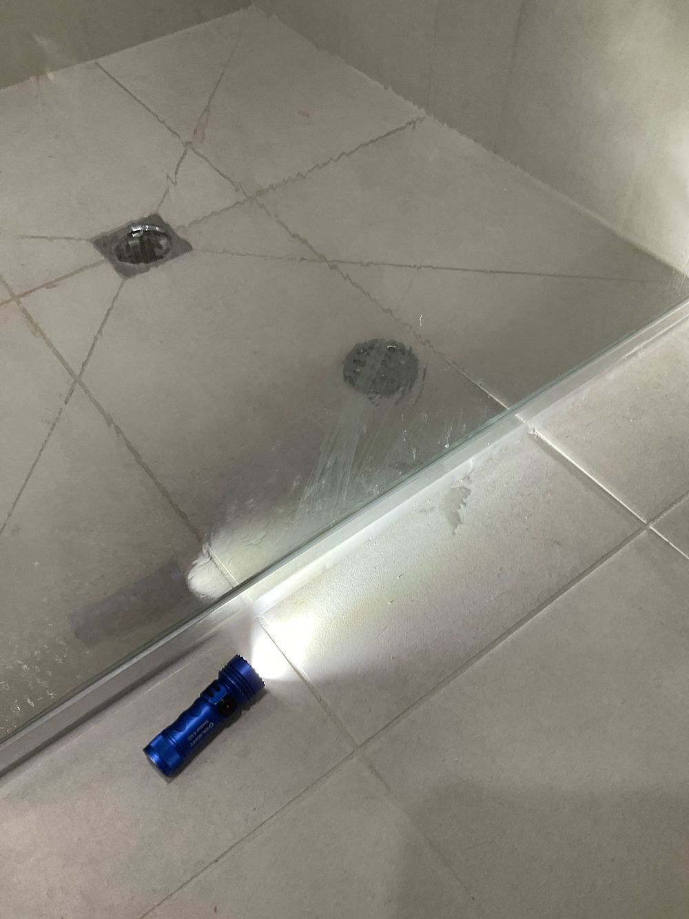 Shower leaking out of its enclosure under a normal spray test, found during a pre-handover (PCI) inspection in Manor Lakes